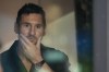 Inter Miami forward Lionel Messi looks through the glass wall of a private box at the start of the team's U.S. Open Cup final soccer match against the Houston Dynamo, Wednesday, Sept. 27, 2023, in Fort Lauderdale, Fla. Houston won 2-1. (AP Photo/Rebecca Blackwell)