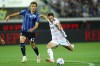 Juventus' Federico Chiesa, right, prepares to kick the ball ahead of Atalanta's Giorgio Scalvini during the Serie A soccer match between Atalanta and Juventus at the Gewiss stadium in Bergamo, Italy, Sunday, Oct. 1, 2023. (Spada/LaPresse via AP)