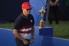 United States' Team Captain Zach Johnson walks past the Ryder Cup trophy during the presentation ceremony, Europe have won the Ryder Cup at Marco Simone Golf Club in Guidonia Montecelio, Italy, Sunday, Oct. 1, 2023. (AP Photo/Andrew Medichini)