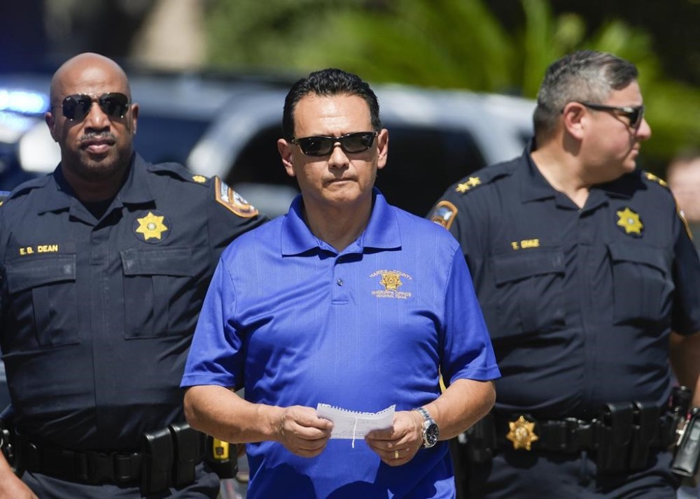 Harris County Sheriff Sheriff Ed Gonzalez walks to a press conference as deputies respond to a scene of a shooting, Sunday, Oct. 1, 2023, in Houston. Gonzalez says deputies responded to the shootings in northwest Houston Sunday morning and found multiple gunshot victims. (Jason Fochtman/Houston Chronicle via AP)