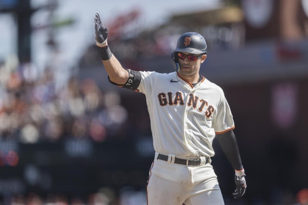 San Francisco Giants' Blake Sabol gestures after hitting a single against the Los Angeles Dodgers during the third inning of a baseball game in San Francisco, Sunday, Oct. 1, 2023. (AP Photo/John Hefti)