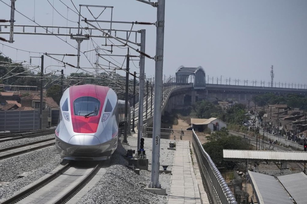 High-speed train is seen during the opening ceremony for launching Southeast Asia's first high-speed railway at Padalarang station in Bandung, West Java, Indonesia, Monday, Oct. 2, 2023. Indonesian President Joko Widodo launched Southeast Asia's first high-speed railway that will start its commercial operations on Monday, a key project under China's Belt and Road infrastructure initiative that will cut travel time between two cities from the current three hours to about 40 minutes. (AP Photo/Achmad Ibrahim)