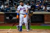 New York Mets' DJ Stewart tosses his bat and helmet after striking out during the fourth inning of the team's baseball game against the Miami Marlins on Thursday, Sept. 28, 2023, in New York. (AP Photo/Frank Franklin II)