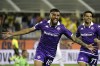 Fiorentina's Nicolas Gonzalez, left, celebrates after scoring their side's first goal of the game during the Serie A soccer match between Fiorentina and Cagliari at the Artemio Franchi stadium in Florence, Italy, Monday Oct. 2, 2023. (Marco Bucco/LaPresse via AP)