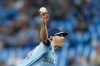 Toronto Blue Jays starting pitcher Kevin Gausman (34) works against the Texas Rangers during first inning American League MLB baseball action in Toronto on September 14, 2023. THE CANADIAN PRESS/Spencer Colby
