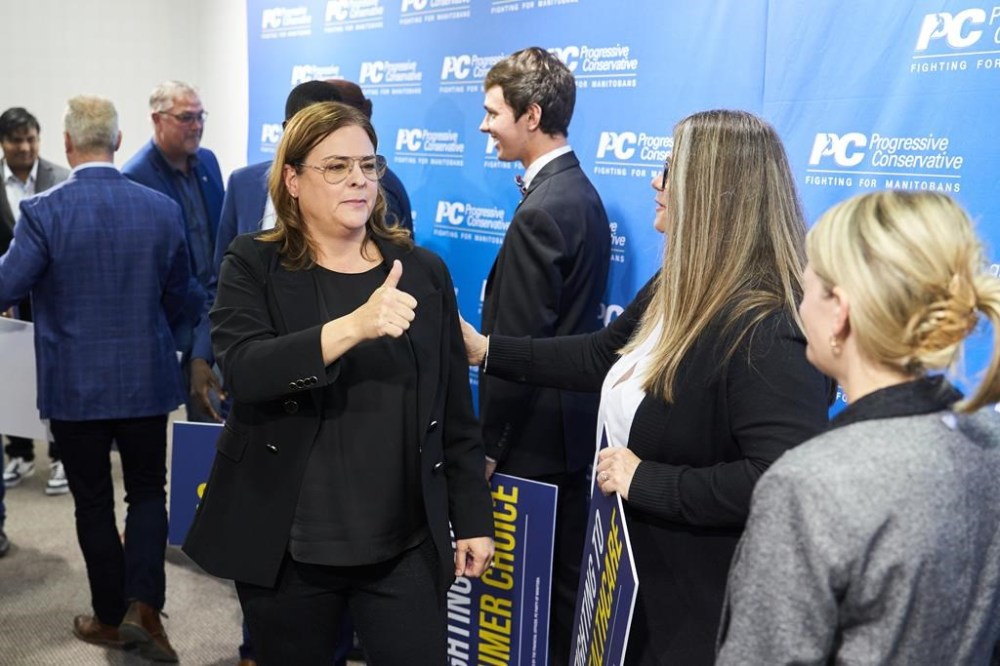 During her first appearance in Winnipeg in more than a week, Manitoba's Progressive Conservative Leader Heather Stefanson stood by her party's decision to take out billboard and newspaper ads that highlighted the province's decision not to search a landfill for the remains of two First Nations women on the final day of campaigning ahead of Tuesday's provincial election. Stefanson gestures following a media conference surrounded by candidates at the PC Party campaign office, the day before the Manitoba provincial election in Winnipeg, Monday, Oct. 2, 2023. THE CANADIAN PRESS/David Lipnowski