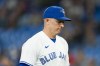 Toronto Blue Jays relief pitcher Chad Green (37) reacts during ninth inning American League MLB baseball action against the Texas Rangers in Toronto, on Wednesday, Sept. 13, 2023. THE CANADIAN PRESS/Spencer Colby