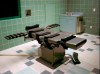 FILE - The interior of the execution chamber in the U.S. Penitentiary in Terre Haute, Ind., is seen, March 22, 1995. Fresh details are emerging three years since 13 historic federal executions were carried out in the final six months of Donald Trump's presidency. (AP Photo/Chuck Robinson, File)