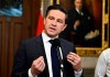 Conservative Leader Pierre Poilievre speaks to reporters in the Foyer of the House of Commons on Parliament Hill in Ottawa, on Tuesday, Oct. 3, 2023. THE CANADIAN PRESS/Justin Tang