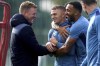 Newcastle United's Kieran Trippier, center, and Callum Wilson, right, speak to manager Eddie Howe during a training session at the Newcastle United Training Centre, Darsley Park, Benton, England, Tuesday Oct. 3, 2023. Newcastle will face Paris Saint-Germain for a Champions League group F soccer match on Wednesday. (Owen Humphreys/PA via AP)