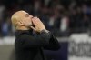 Manchester City's head coach Pep Guardiola kisses supporters at the end of the Champions League group G soccer match between RB Leipzig and Manchester City in Leipzig, Germany, Wednesday, Oct. 4, 2023. (AP Photo/Matthias Schrader)