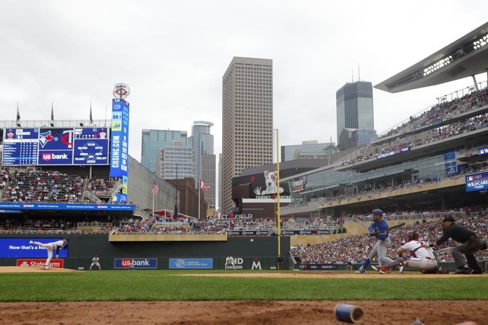 Minnesota Twins pitcher Sonny Gray, bottom, left, pitches to Toronto Blue Jays' Kevin Kiermaier during the fourth inning of Game 2 of an AL wild-card baseball playoff series Wednesday, Oct. 4, 2023, in Minneapolis. (AP Photo/Bruce Kluckhohn)
