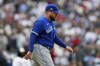 Toronto Blue Jays manager John Schneider walks to the mound to make a pitching change during the fourth inning of Game 2 of an AL wild-card baseball playoff series against the Minnesota Twins Wednesday, Oct. 4, 2023, in Minneapolis. (AP Photo/Abbie Parr)