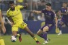 Nashville SC midfielder Anibal Godoy (20) takes the ball from Orlando City midfielder Mauricio Pereyra, right, during the first half of an MLS soccer match Wednesday, Oct. 4, 2023, in Nashville, Tenn. (AP Photo/George Walker IV)