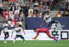 Vancouver Whitecaps' Javain Brown, top right, and St. Louis City's Nicholas Gioacchini vie for the ball during the first half of an MLS soccer match in Vancouver, on Wednesday, October 4, 2023. THE CANADIAN PRESS/Darryl Dyck
