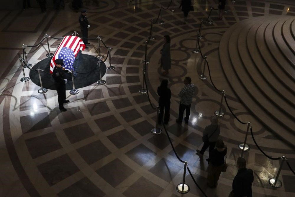 Members of the public line up single file to await their turn to pay their respects as the casket of the late Sen. Dianne Feinstein lies in the Rotunda of City Hall in San Francisco, Calif. Wednesday, Oct. 4, 2023. (Jessica Christian/San Francisco Chronicle via AP)