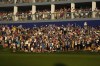 The crowd wave at the players on the 17th hole during the afternoon Fourballs matches at the Ryder Cup golf tournament at the Marco Simone Golf Club in Guidonia Montecelio, Italy, Saturday, Sept. 30, 2023. (AP Photo/Andrew Medichini)