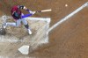 Arizona Diamondbacks' Lourdes Gurriel Jr. hits an RBI single during the sixth inning of a Game 2 of their National League wildcard baseball series against the Milwaukee Brewers Wednesday, Oct. 4, 2023, in Milwaukee. (AP Photo/Morry Gash)