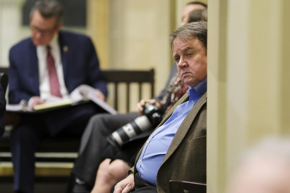 Rev. Don Heath, executive director of the Oklahoma Coalition to Abolish the Death Penalty, listens to Andy Lester, attorney and former U.S. magistrate judge, at an interim hearing on the death penalty at the Oklahoma Capitol in Oklahoma City, Thursday, Oct. 5, 2023. (Doug Hoke/The Oklahoman via AP)
