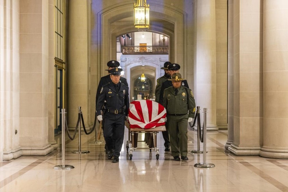 The casket of U.S. Sen. Dianne Feinstein is transported from inside City Hall to a hearse on Wednesday, Oct. 4, 2023, in San Francisco. (Santiago Mejia/San Francisco Chronicle via AP, Pool)