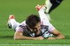Juventus' Federico Chiesa grimaces on the ground during the Serie A soccer match between Atalanta and Juventus at the Gewiss stadium in Bergamo, Italy, Sunday, Oct. 1, 2023. (Spada/LaPresse via AP)