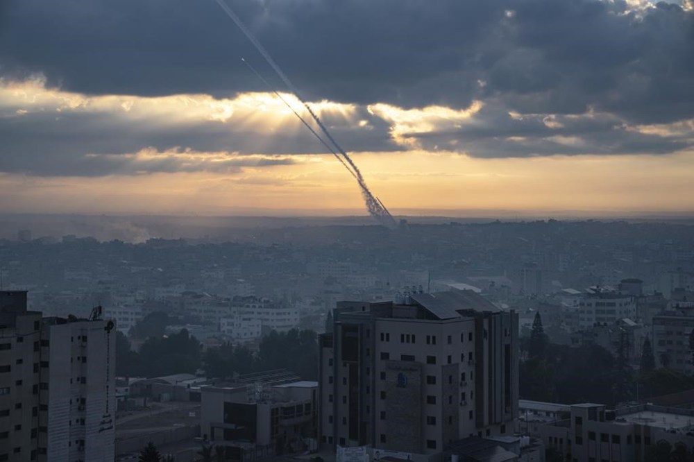 Rockets are fired toward Israel from Gaza, Saturday, Oct. 7, 2023. (AP Photo/Fatima Shbair)