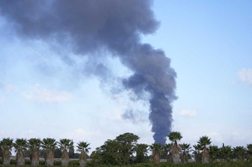 A column of smoke rises from the south of Israel on Saturday, Oct. 7, 2023. Palestinian militants in the Gaza Strip infiltrated Saturday into southern Israel and fired thousands of rockets into the country while Israel began striking targets in Gaza in response. (AP Photo/Ohad Zwigenberg)