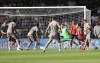 Tottenham Hotspur's Micky van de Ven, right, scores his side's first goal of the game, during the English Premier League soccer match between Luton Town and Tottenham Hotspur, at Kenilworth Road, in Luton, England, Saturday, Oct. 7, 2023. (Bradley Collyer/PA via AP)