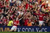 Manchester United's Scott McTominay, left, and Manchester United's Alejandro Garnacho celebrate scoring their side's second goal during the English Premier League soccer match between Manchester United and Brentford at the Old Trafford stadium in Manchester, England, Saturday, Oct. 7, 2023.(AP Photo/Jon Super)
