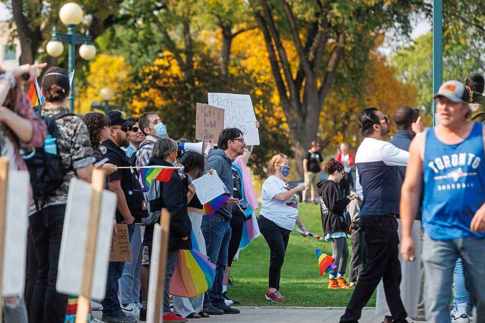 MIKE DEAL / WINNIPEG FREE PRESS
Hundreds of protesters face off at the Manitoba Legislative building from The Forks.