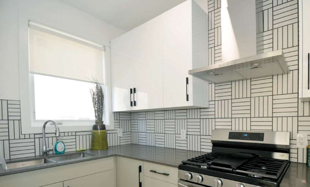 A spice kitchen makes everything easier with the extra range, sink, counter and cabinet space.