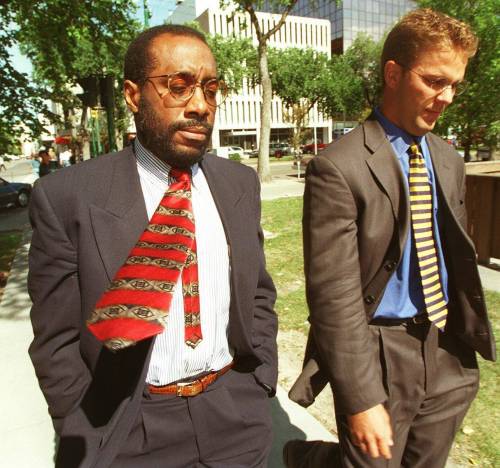 Joe Bryksa / Winnipeg Free Press files
                                In this 1997 photo, Dr. Jonah Odim (left) and his lawyer arrive at a Winnipeg courthouse for a hearing into the deaths of 12 children in 1994
at the Children&rsquo;s Hospital at Health Sciences Centre.