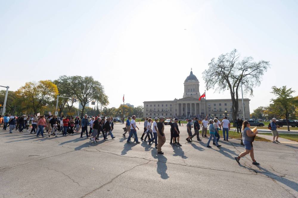 MIKE DEAL / WINNIPEG FREE PRESS FILES
Anti-trans protesters and Trans Rights supporters gathered at the Manitoba Legislative building last month.