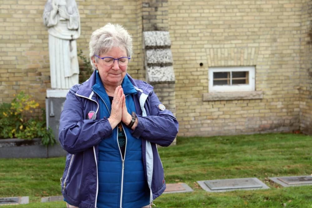 SUPPLIED
Sandy Stewart leads in a prayerful song at the Oct. 4 gathering to support women’s equality in the Roman Catholic Church.