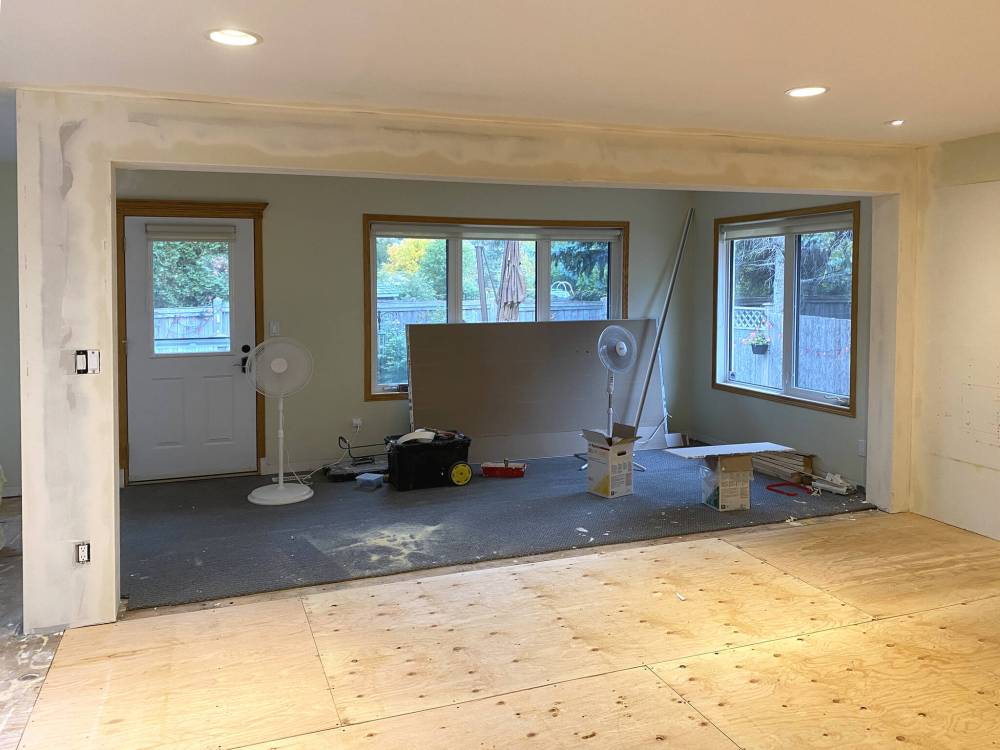 The sunken living room was raised to meet the elevation of the main floor.