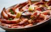 JOHN WOODS / WINNIPEG FREE PRESS FILES
                                Peel And Eat Tiger Prawns at the soft opening of the Friskee Pearl.