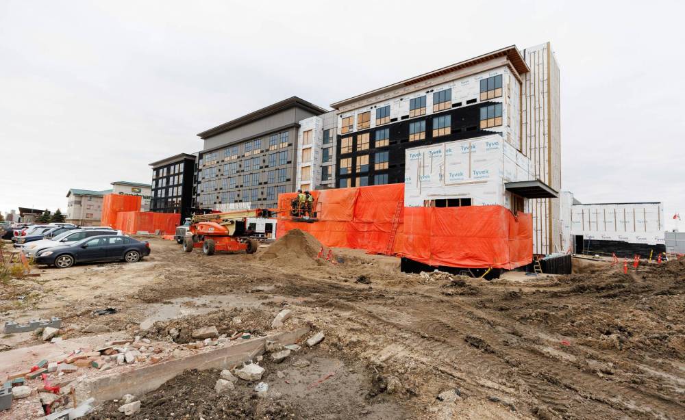 The new Sandman Signature hotel beside the existing Sandman Hotel and Suites on Sargent Avenue is expected to open in 2025. (Mike Deal / Winnipeg Free Press)