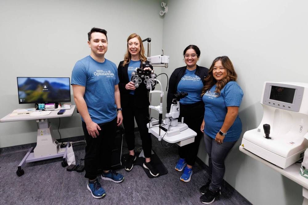 Optometrists Dr. Andrew Styba (from left), Dr. Carmen Recksiedler, 4th year optometrist intern Shehnaaz Brar, and Dr. Irene Mestito-Dao were particpants at the Gizhe Waa Tii-Si-Win Expo Tuesday morning. (Mike Deal / Winnipeg Free Press)