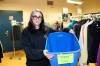 BROOK JONES / WINNIPEG FREE PRESS
                                Main Street Project Communications Specialist Cindy Titus holding an empty bin for socks at the local shelter’s clothing donation area in Winnipeg, Man., Friday, Oct. 20, 2023. Main Street Project is collecting donations of socks for its Socktober campaign. The shelter also needs donations of everyday clothing items and with cooler weather approaching, donations of thermal wear, winter boots, winter coats and jackets, snow pants, scarves and hand warmers are also in need.