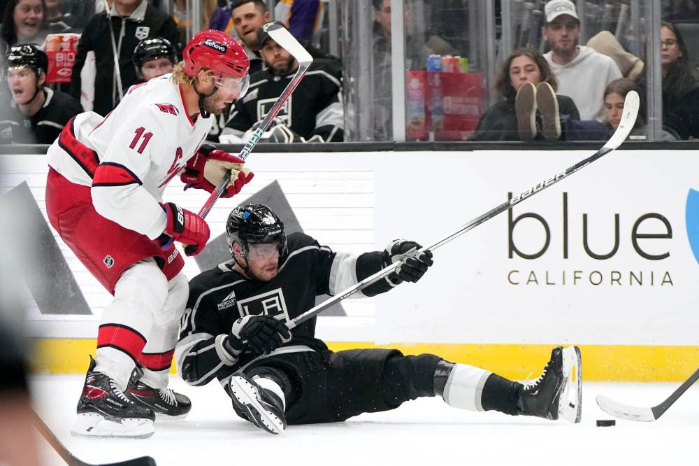 MARK J. TERRILL / THE ASSOCIATED PRESS FILES
L.A. Kings forward Pierre-Luc Dubois polishes the ice Saturday against the Carolina Hurricanes.