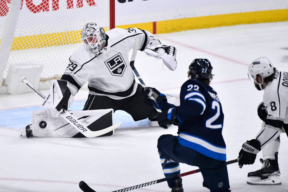 Fred Greenslade / THE CANADIAN PRESS
Cam Talbot makes a save on Mason Appleton. The Kings netminder stopped all but one of the shots directed his way Tuesday night.