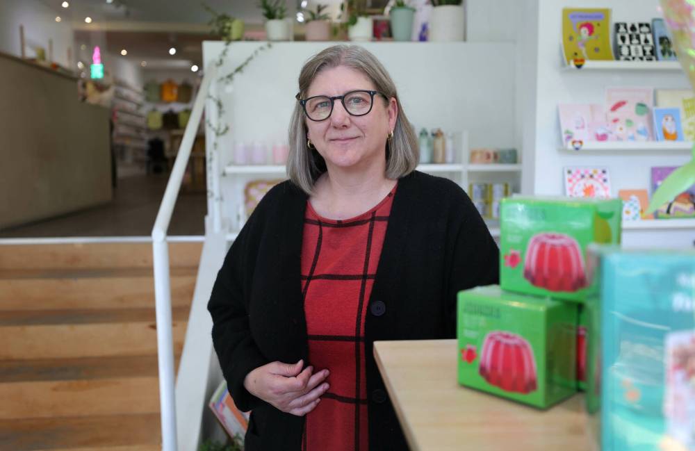 RUTH BONNEVILLE / WINNIPEG FREE PRESS
                                Trish Wittmann, manager of Riley Grae on Corydon Ave., is considering holding sales this holiday season to attract cash-strapped consumers.