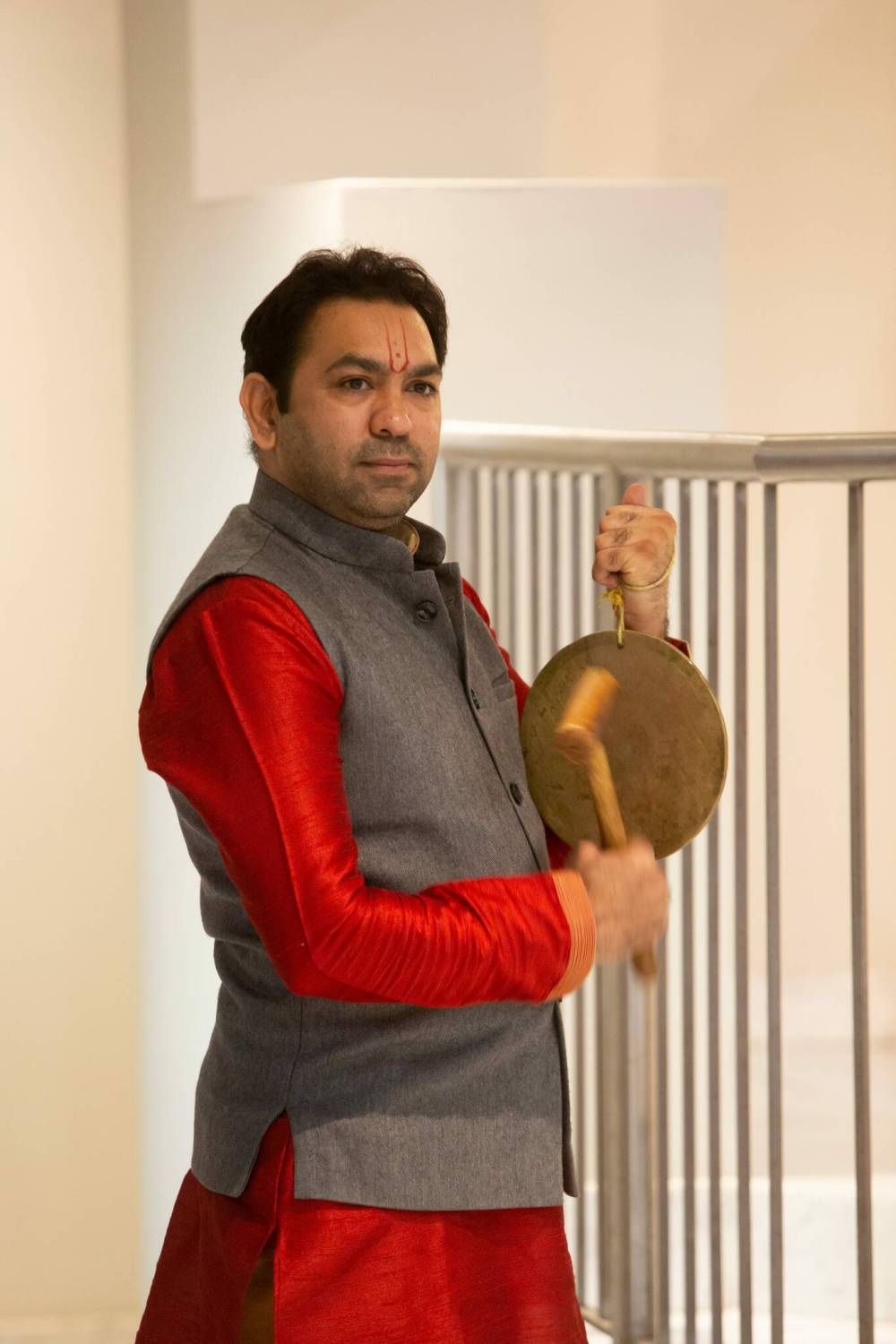 BROOK JONES / WINNIPEG FREE PRESS 
                                Pandit Shrikant Sharma, who is a priest with the Hindu Society of Manitoba, rings the gong bell during the Sharadiya Navratri Festival.