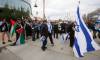 JOHN WOODS / WINNIPEG FREE PRESS
                                Police step in as Israeli supporters retrieve a flag taken by Palestinian supporters as both sides gather outside the Canadian Museum for Human Rights in Winnipeg on Sunday, October 22, 2023.