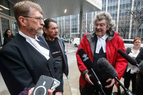 JOHN WOODS / WINNIPEG FREE PRESS
                                Jerome Kennedy, left, and James Lockyer, right, lawyers with Innocence Canada, speak about the bail hearing of Clarence Woodhouse outside the Manitoba law courts in Winnipeg.