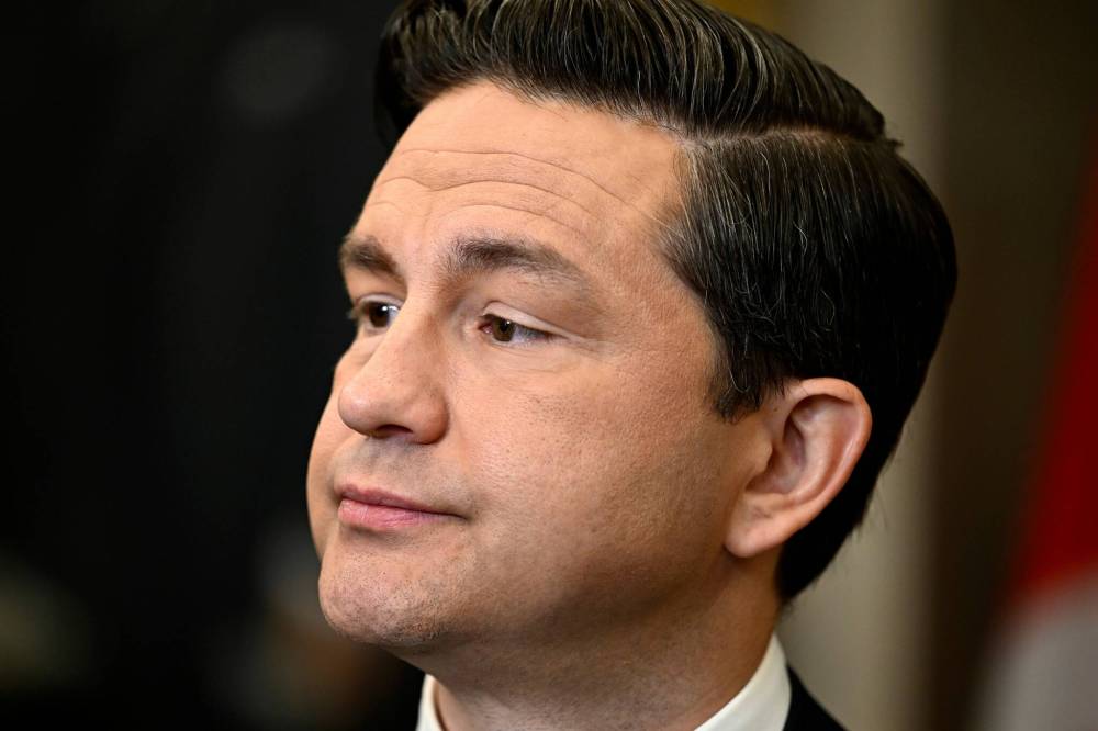 Justin Tang / Canadian Press Files
                                Conservative Leader Pierre Poilievre speaks to reporters in the Foyer of the House of Commons on Parliament Hill in Ottawa, on Oct. 3.