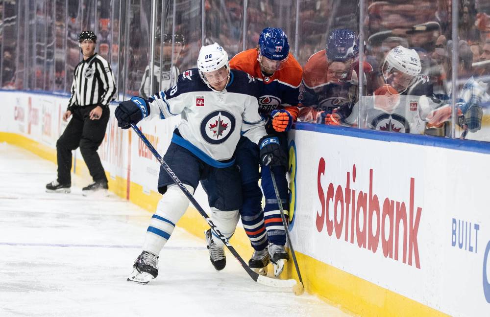 Jason Franson / The Canadian Press files
Jets veteran defenceman Nate Schmidt (left) has bounced back with a pair of solid outings after being a healthy scratch.