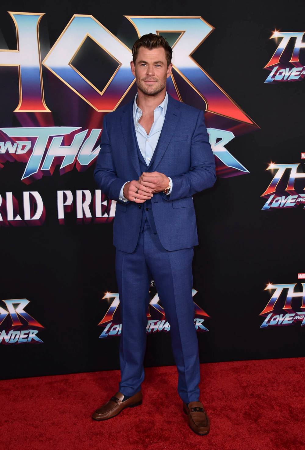 (Photo by Jordan Strauss/Invision/AP)
                                Chris Hemsworth in an example of cocktail attire for men.