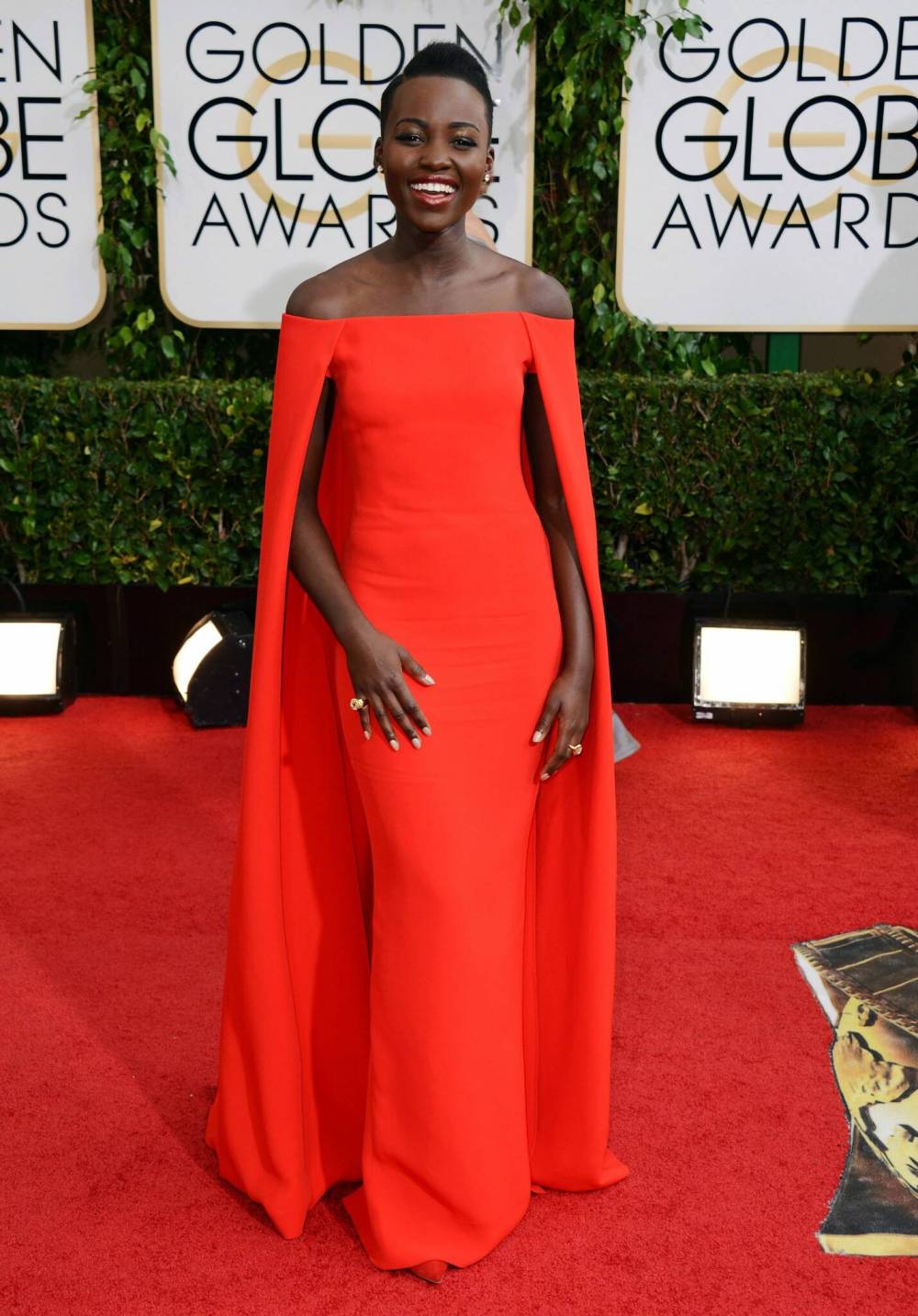 (Photo by Jordan Strauss/Invision/AP, file)
                                Lupita Nyong’o in black tie attire for women.