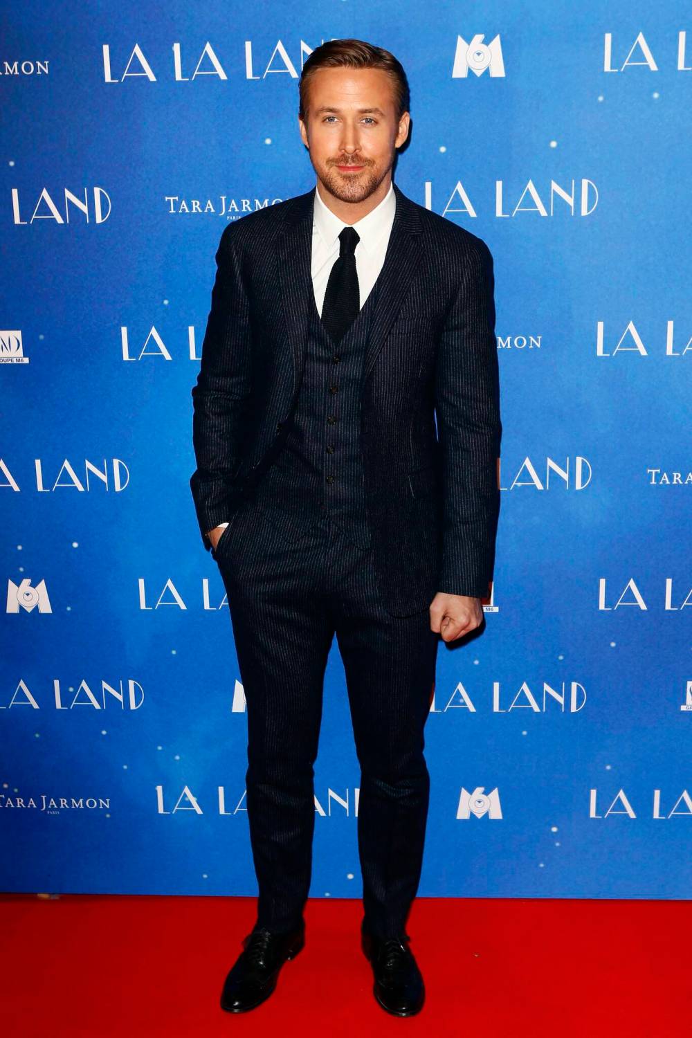 (AP Photo/Francois Mori)
                                Ryan Gosling displays formal attire.